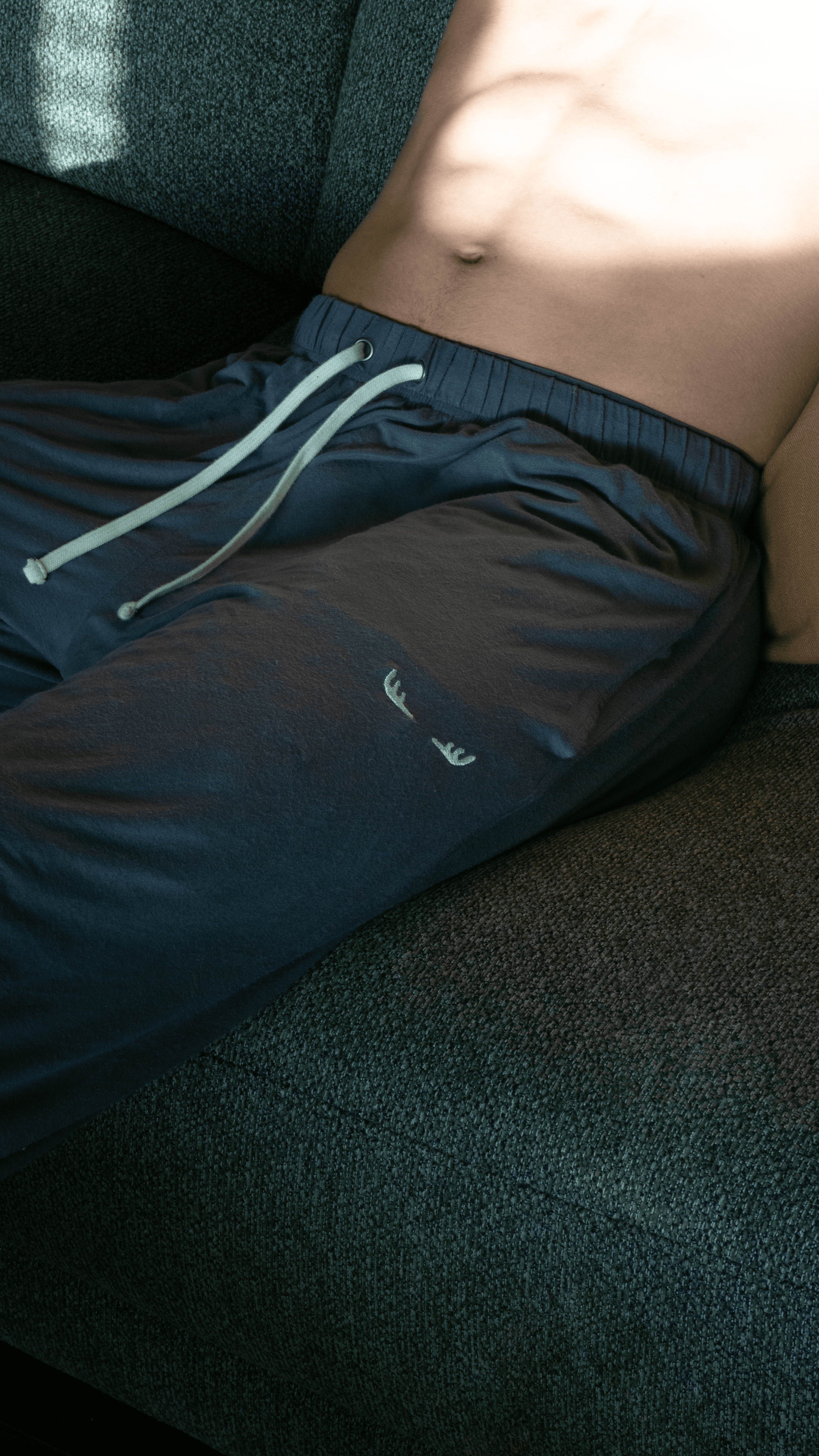 MØS Pyjama Pant — worn on couch