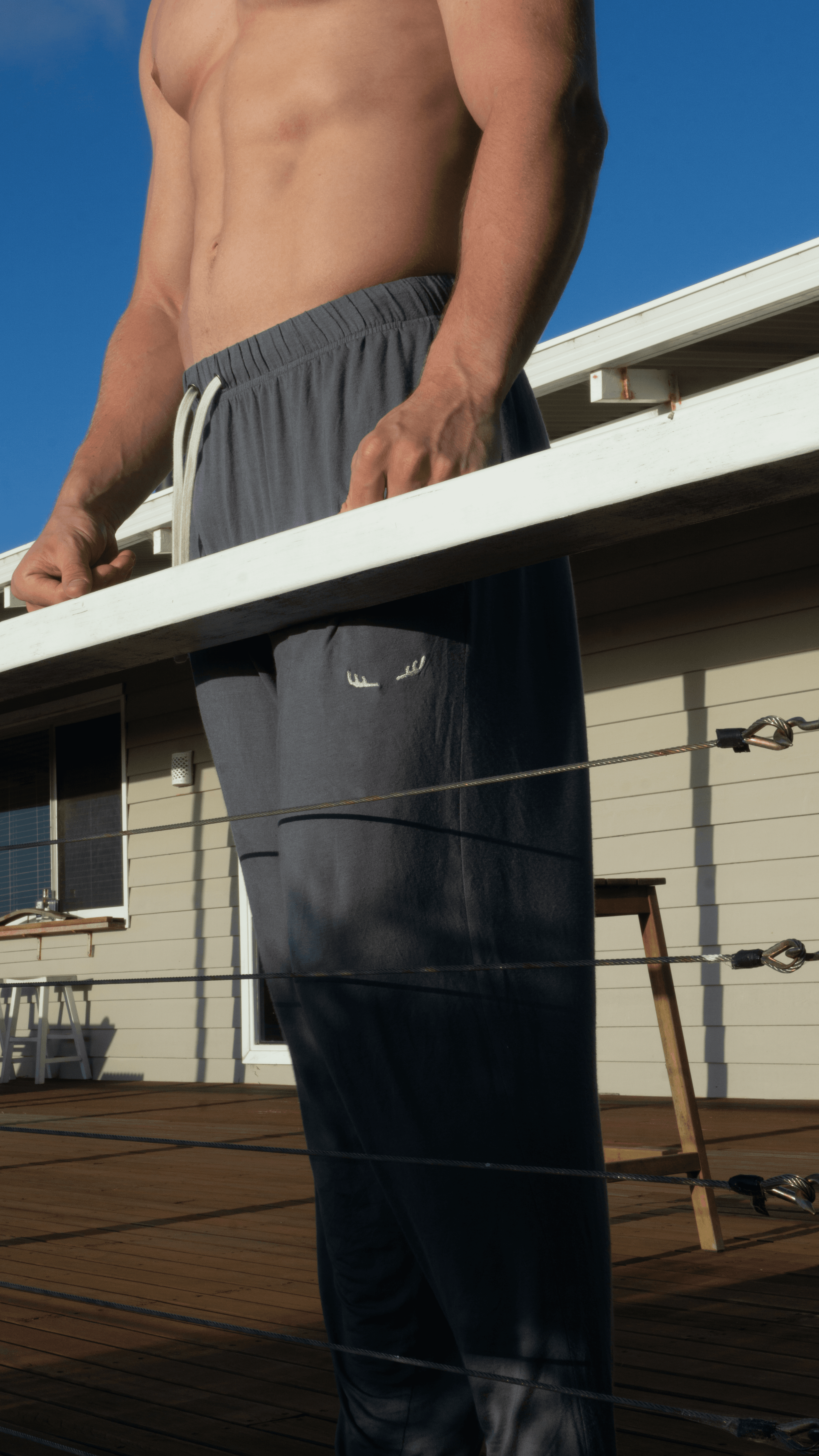 MØS Pyjama Pant — leaning on deck